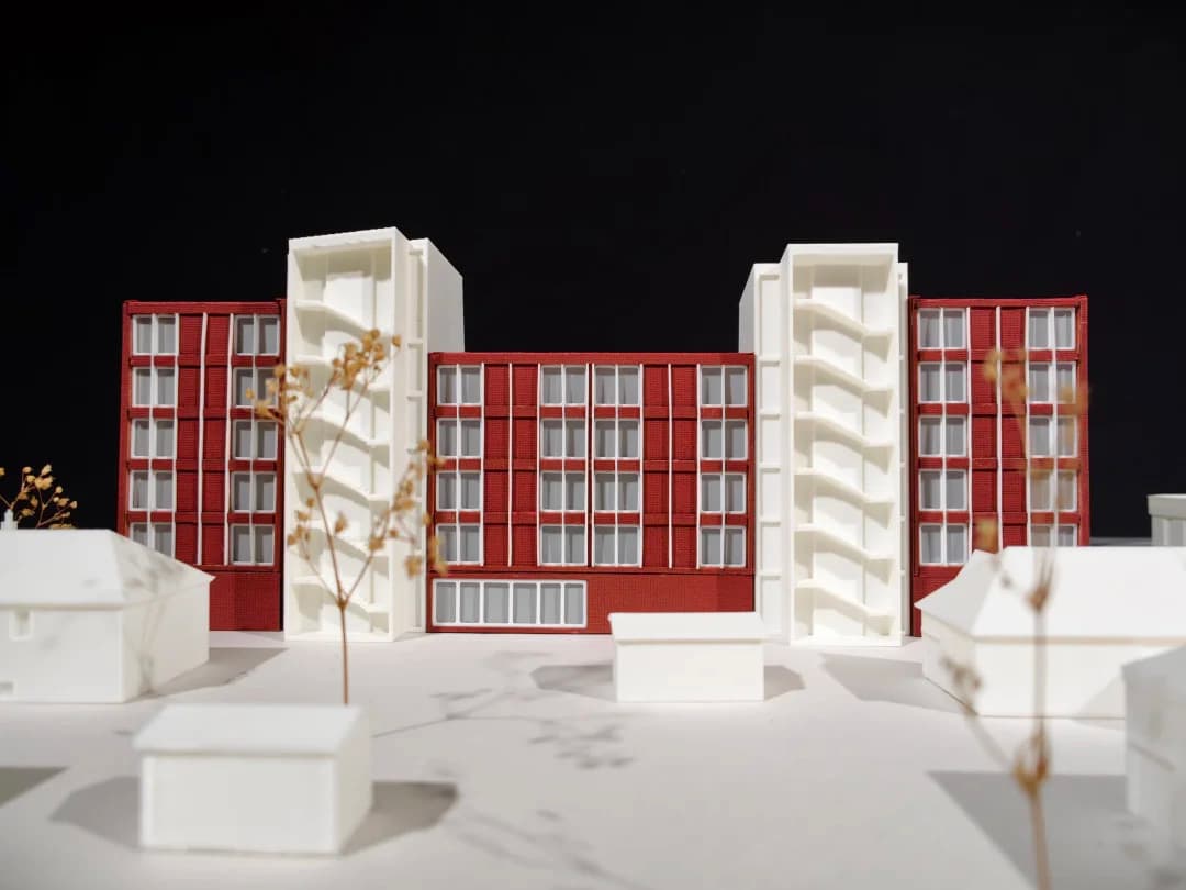 Mixed-Use Development — Multi-building residential complex with detailed brick facades and surrounding urban context